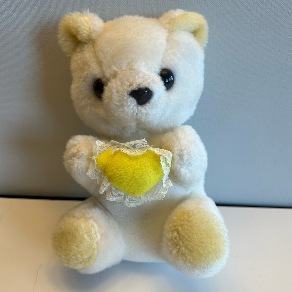 Adorable White Teddy Bear with Yellow Heart